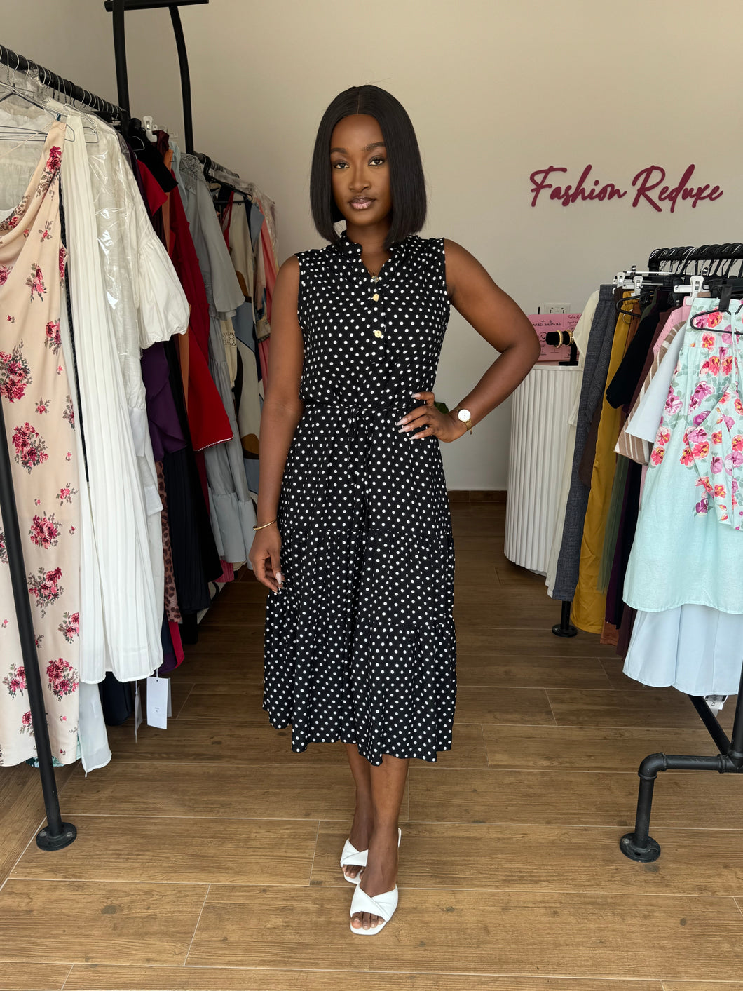 Black and white polka dot sleeveless polka dot dress
