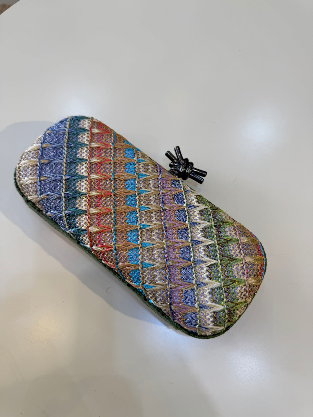 Green pattern woven clutch