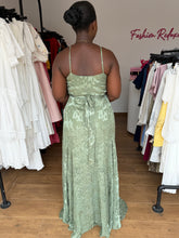 Load image into Gallery viewer, Green patterned sleeveless wrap maxi dress
