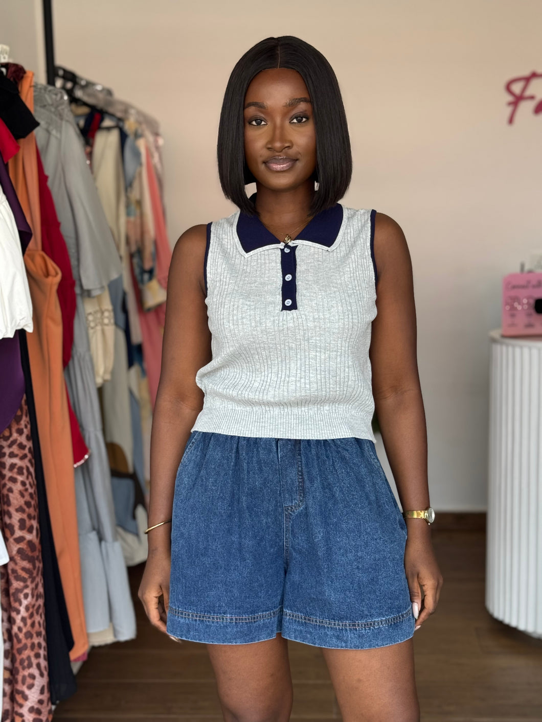 Grey and blue sleeveless polo top