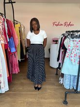 Load image into Gallery viewer, Black and white maxi pleated polka dot skirt
