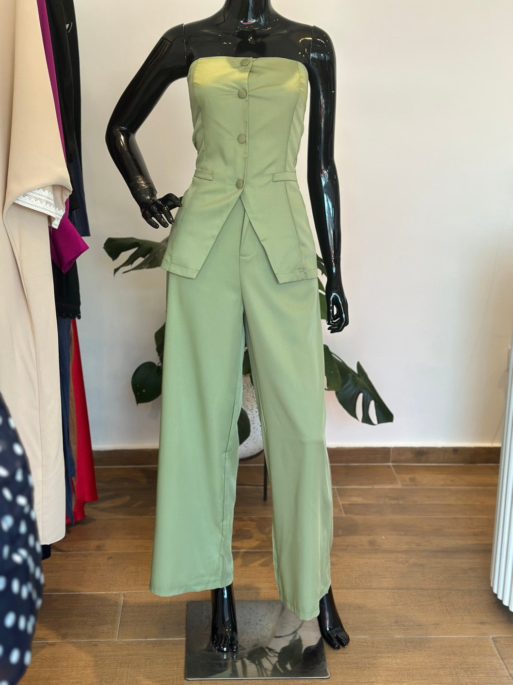 Green sleeveless two piece