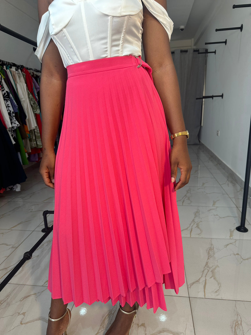 Pink asymmetric pleated skirt