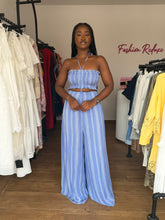 Load image into Gallery viewer, Light blue and white striped cut out elasticated jumpsuit

