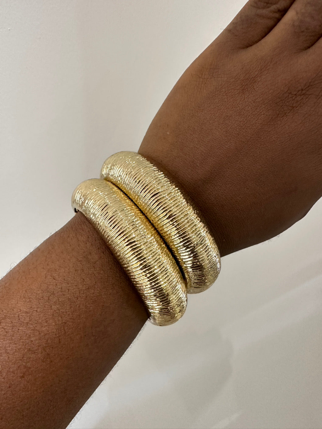 Textured gold bangle