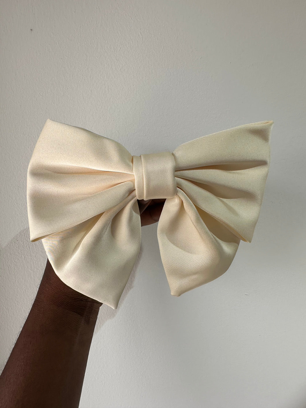 White satin bow hair clip