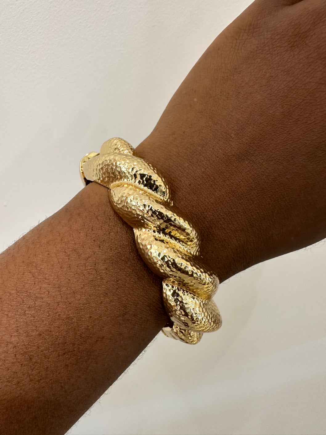 Twisted gold bangle